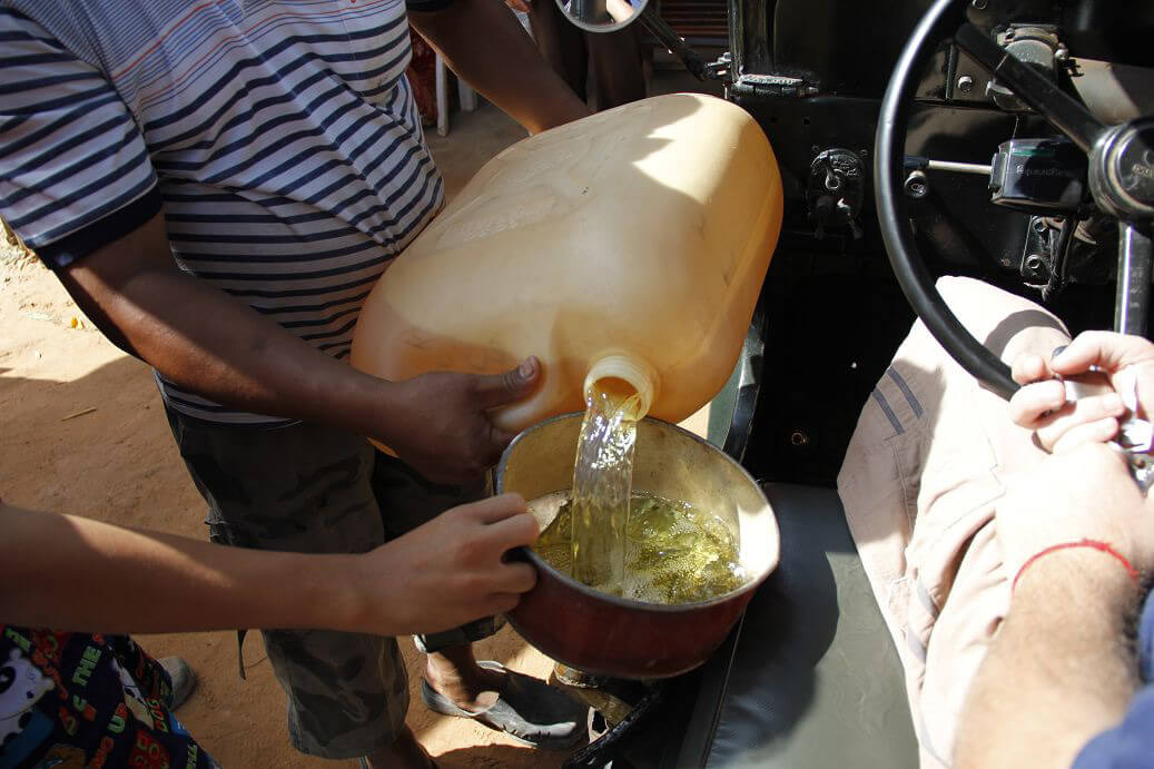 Refueling of a jeep in Cambodia