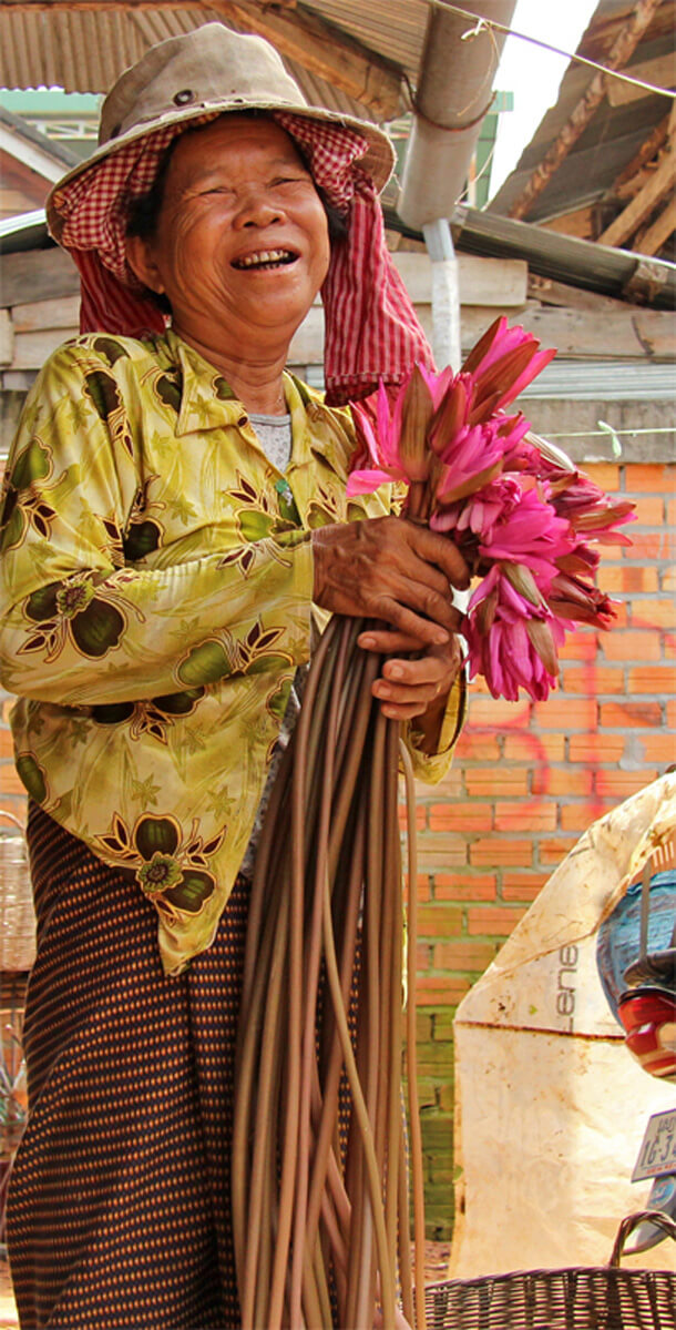 Woman with Lotus in Cambodia