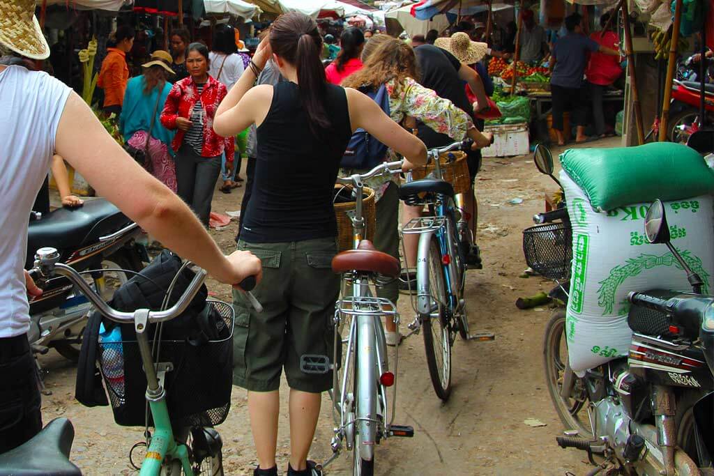 Bycicle tour through a local market in Siem Reap