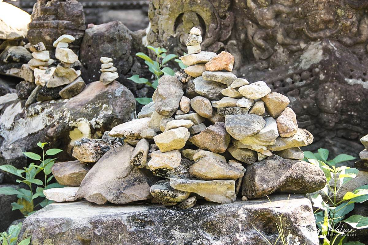 Piles with stones at Angkor Wat