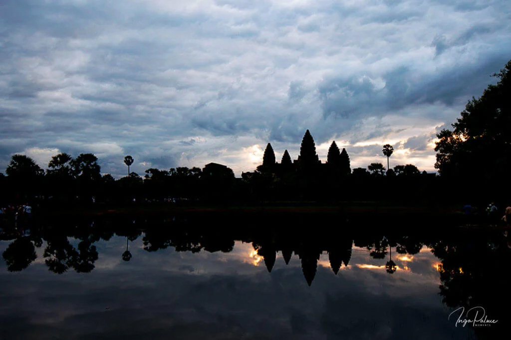Angkor Wat, 5 towers in the morning - sunrise at the pond with dramatic sky. 