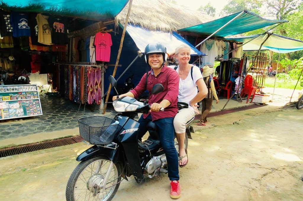 Vutha with me on his motorbike at Angkor