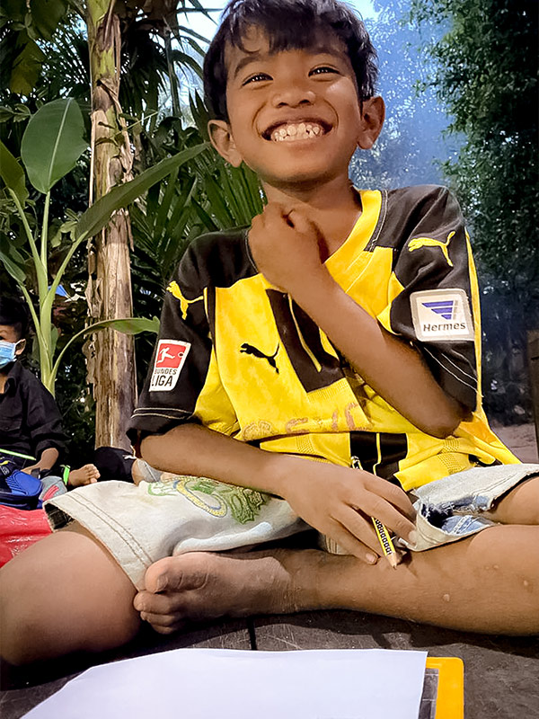 boy laughing village homeschool